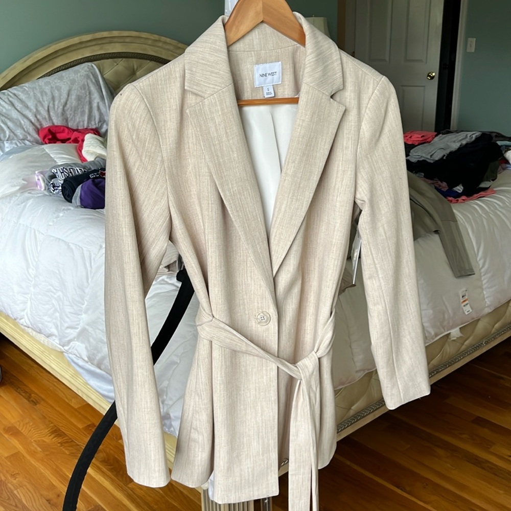Beige jacket brand new with tag